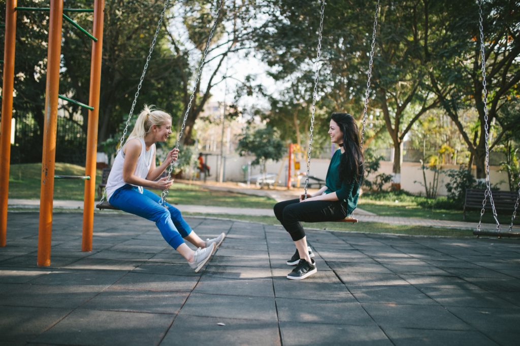 Women talking and swinging back and forth.  Yes, And Improv Rule  Photo by Bewakoof dot com Official at Unsplash